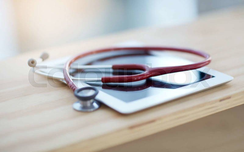Stethoscope and health planning tools on a clinic desk
